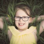 Girl up close in grass