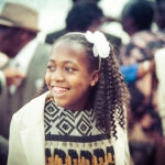 natural shot of girl guest at a wedding